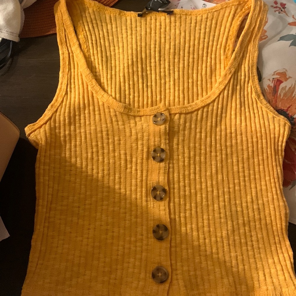 Orange buttoned crop top